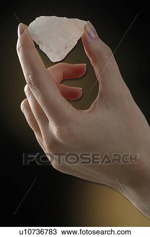 Hand is holding a crystal View Large Photo Image Stock Image - Hand is holding a crystal. Fotosearch