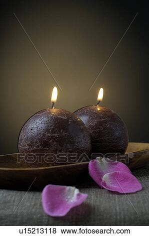 Two candels and petals View Large Photo Image Stock Photo - Two candels and petals. Fotosearch