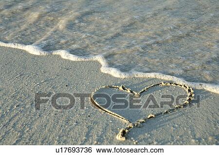 Heart in the sand View Large Photo Image Stock Photograph - Heart in the sand. Fotosearch
