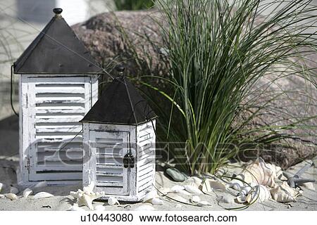 Two table lanterns and beach grass View Large Photo Image Stock Image - Two table lanterns and beach grass. Fotosearch