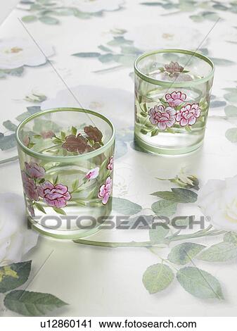 Stock Image - Two glasses with a flowery pattern. Fotosearch