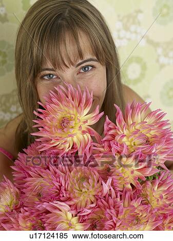 Woman with a bouquet of chrysanthemum View Large Photo Image Stock Photography - Woman with a bouquet of chrysanthemum. Fotosearch