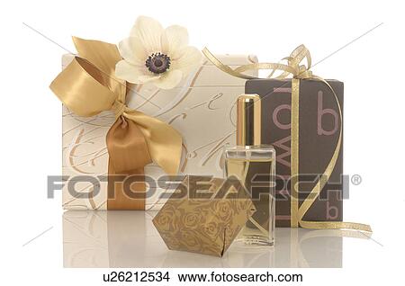 Gifts and small perfume bottle View Large Photo Image Picture - Gifts and small perfume bottle. Fotosearch