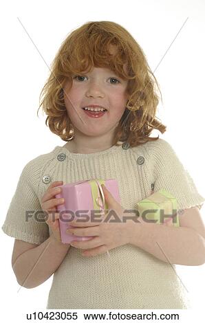 Little girl with gifts View Large Photo Image Stock Photography - Little girl with gifts. Fotosearch