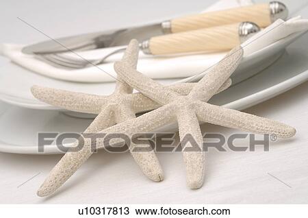 Place setting decorated with starfishes View Large Photo Image Stock Image - Place setting decorated with starfishes. Fotosearch
