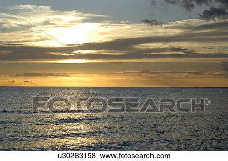Sunset at the sea View Large Photo Image Stock Photo - Sunset at the sea. Fotosearch