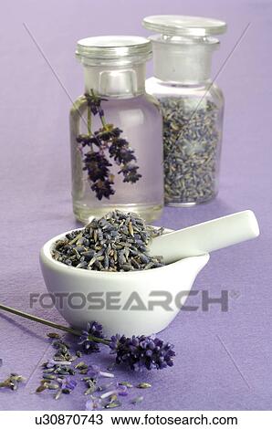 Stock Image - Lavender in a bottle and in a motar. Fotosearch