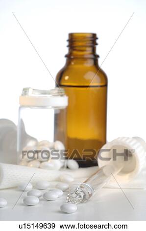 Stock Photo - Pills and drops. Fotosearch
