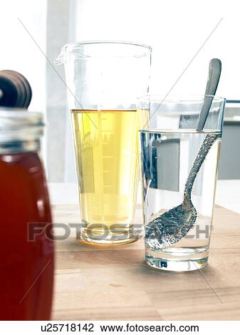 Sleeping aid: Cider vinegar, tepid water and honey View Large Photo Image Stock Image - Sleeping aid: Cider vinegar, tepid water and honey. Fotosearch