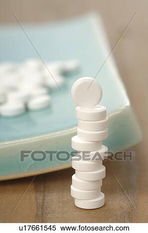 Stack of Dr. Schüssler's cell salts pills View Large Photo Image Stock Photography - Stack of Dr. Schüssler's cell salts pills. Fotosearch