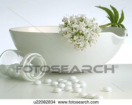 Picture - Valerian and pills. Fotosearch