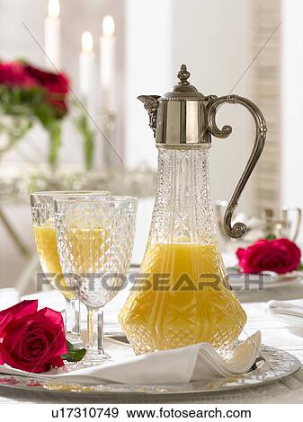 Orange juice in an old carafe View Large Photo Image Stock Photo - Orange juice in an old carafe. Fotosearch