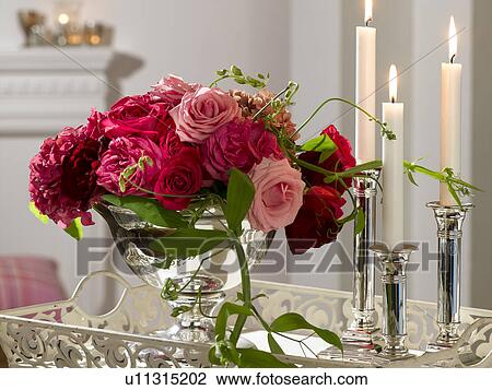 Red bouquet in a silver cup View Large Photo Image Stock Image - Red bouquet in a silver cup. Fotosearch