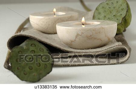 candle holders and lotus flowers View Large Photo Image Stock Photography - candle holders and lotus flowers. Fotosearch