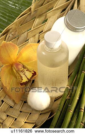 Facial toner with cotton and orchid blossom View Large Photo Image Stock Photograph - Facial toner with cotton and orchid blossom. Fotosearch