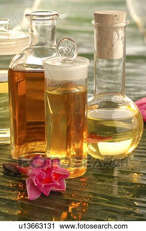 Four bottles and flacons View Large Photo Image Stock Image - Four bottles and flacons. Fotosearch