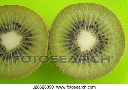 Stock Image - Sliced kiwifruit. Fotosearch