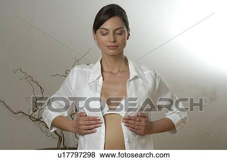 Stock Photo - Woman doing yoga exercise. Fotosearch