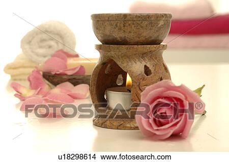 Aroma lamp with a small candle View Large Photo Image Picture - Aroma lamp with a small candle. Fotosearch