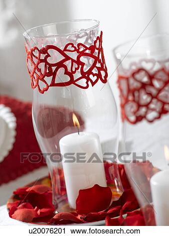 Stock Image - Table lantern with a heart pattern. Fotosearch