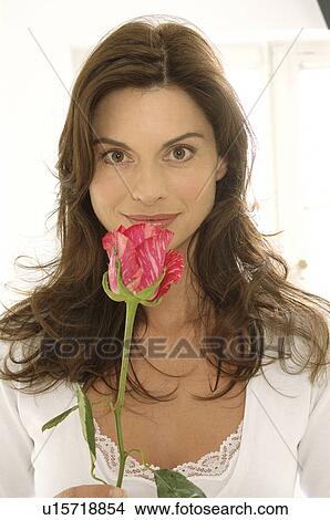 Picture - Woman with a rose. Fotosearch