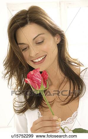 Stock Photo - Woman with a rose. Fotosearch