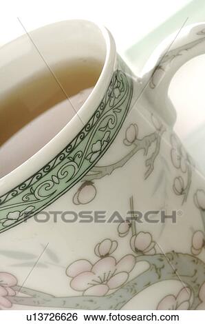 Stock Photograph - Asian style tea mug, close up. Fotosearch