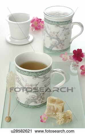 Stock Image - Asian style tea mugs with lids. Fotosearch