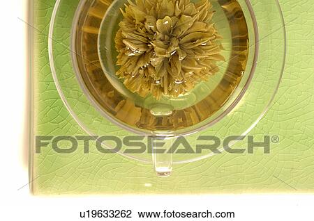 Stock Image - Green tea in a glas cup. Fotosearch