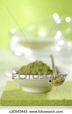 Green tea, powder in a bowl and a wooden spoon View Large Photo Image Stock Image - Green tea, powder in a bowl and a wooden spoon. Fotosearch