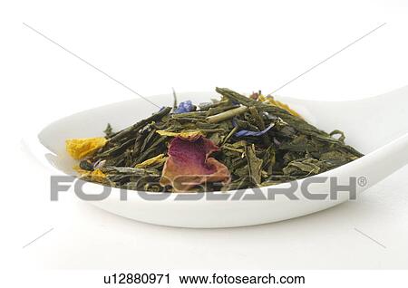 Stock Image - Tea in a porcelain spoon. Fotosearch