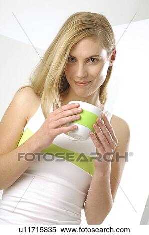 Woman with a cup View Large Photo Image Stock Photography - Woman with a cup. Fotosearch