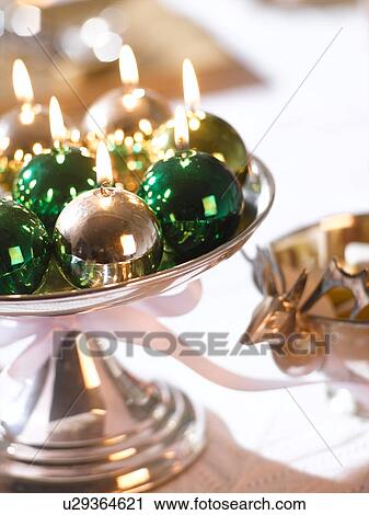 Glossy Christmas tree ball candles in a silver bowl View Large Photo Image Stock Image - Glossy Christmas tree ball candles in a silver bowl. Fotosearch