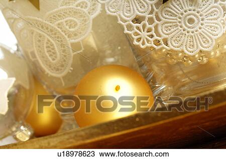 Stock Image - Golden Christmas tree balls. Fotosearch