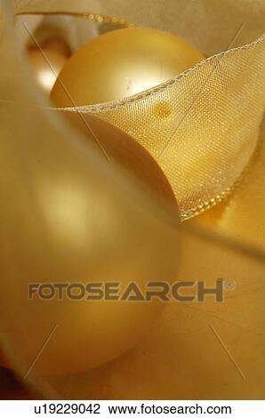 Golden Christmas tree balls View Large Photo Image Stock Image - Golden Christmas tree balls. Fotosearch