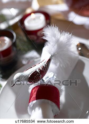 Picture - Napkin ring with bird. Fotosearch