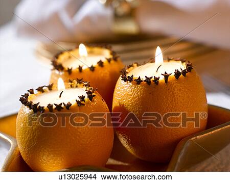 Picture - Orange clove candle. Fotosearch