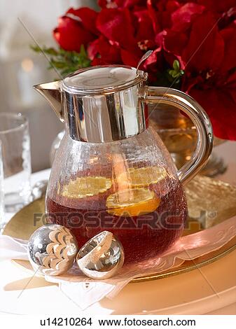 Punchbowl with twists of orange View Large Photo Image Picture - Punchbowl with twists of orange. Fotosearch