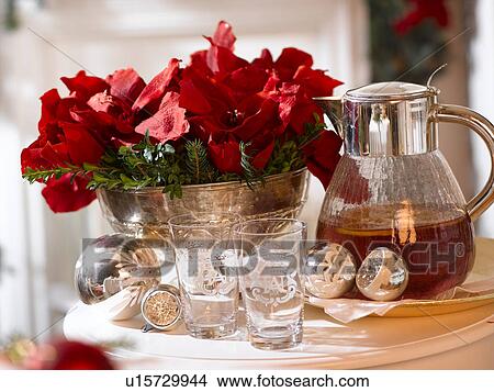 Red amaryllis and a punchbowl View Large Photo Image Picture - Red amaryllis and a punchbowl. Fotosearch