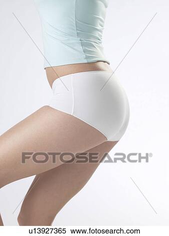 Woman wearing white underwear, cut of waist and femoral View Large Photo Image Stock Photography - Woman wearing white underwear, cut of waist and femoral. Fotosearch
