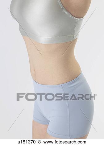 Stock Photo - Woman with sportswear. Fotosearch