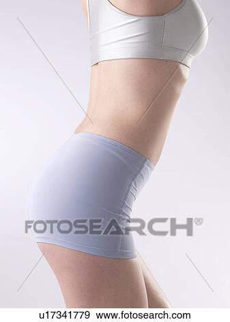 Stock Photo - Woman with sportswear. Fotosearch