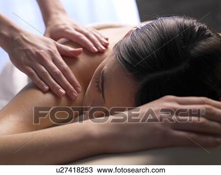 Stock Image - Woman getting a massage. Fotosearch