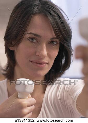 Woman training with barbells View Large Photo Image Stock Image - Woman training with barbells. Fotosearch