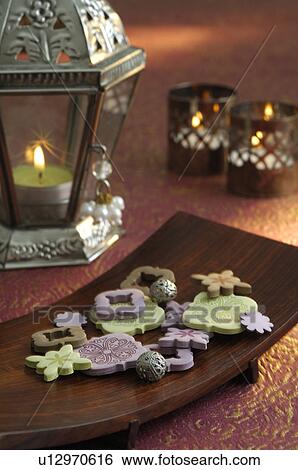 Arrangement of scented fragments of enamelled glass and metal beads View Large Photo Image Stock Photograph - Arrangement of scented fragments of enamelled glass and metal beads. Fotosearch