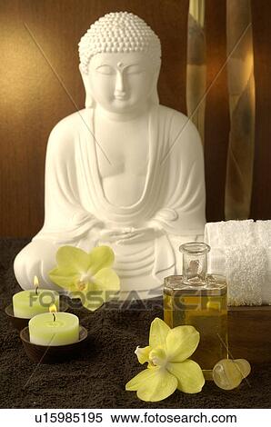 Stock Photography - Buddha and orchid blossoms. Fotosearch