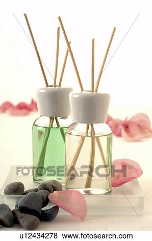Stock Photo - Two aroma lamps with aroma sticks. Fotosearch