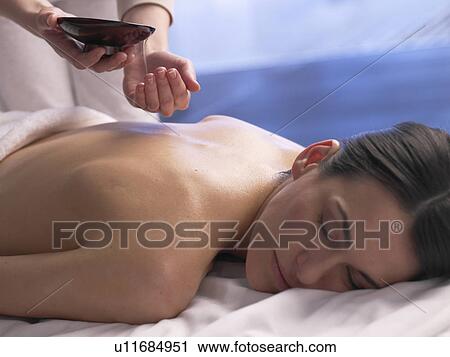 Woman getting a massage View Large Photo Image Stock Image - Woman getting a massage. Fotosearch