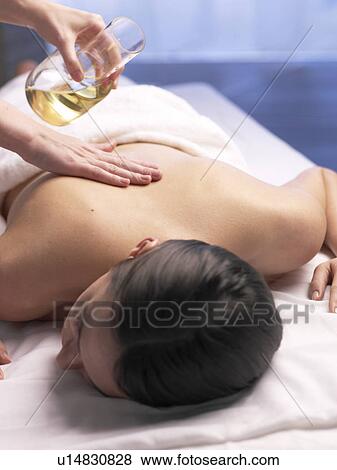 Woman getting a massage View Large Photo Image Stock Photo - Woman getting a massage. Fotosearch