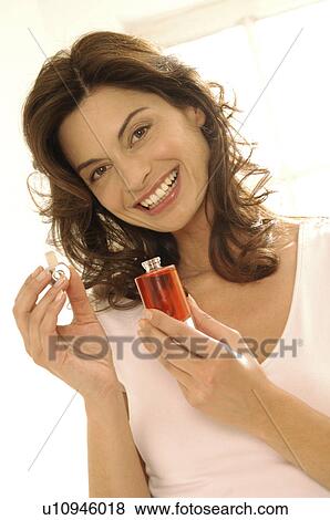 Woman with a flacon View Large Photo Image Stock Photo - Woman with a flacon. Fotosearch